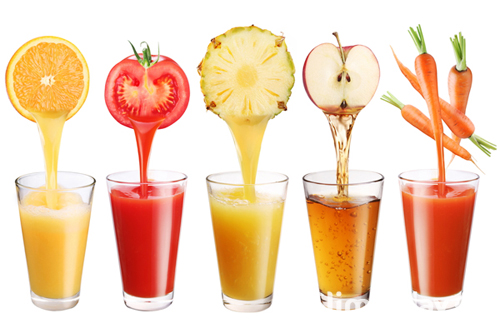 Conceptual image - fresh juice pours from fruits and vegetables